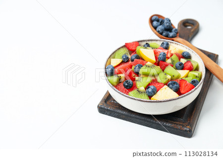 Tasty and healthy nutrition concept - fruit salad Tasty and healthy nutrition concept - fruit salad 113028134