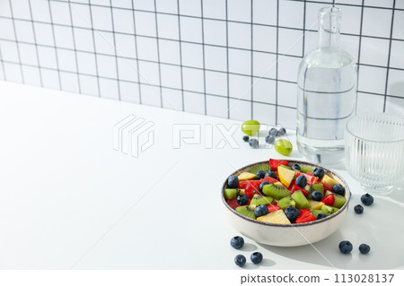 Healthy food and healthy nutrition concept - fruit salad Healthy food and healthy nutrition concept - fruit salad 113028137