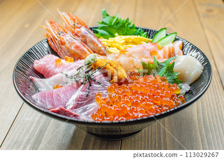 Luxury seafood bowl with red shrimp and salmon roe Luxury seafood bowl with red shrimp and salmon roe 113029267