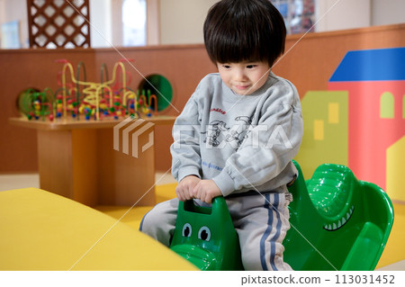 A boy playing around cheerfully 113031452