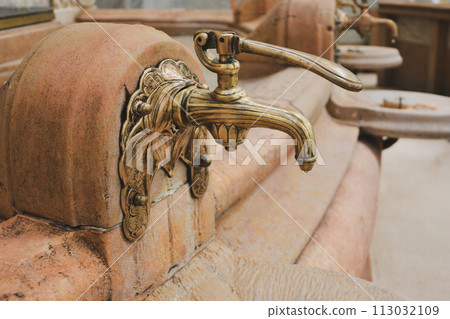 Vintage faucet with a source of mineral water Vintage faucet with a source of mineral water 113032109