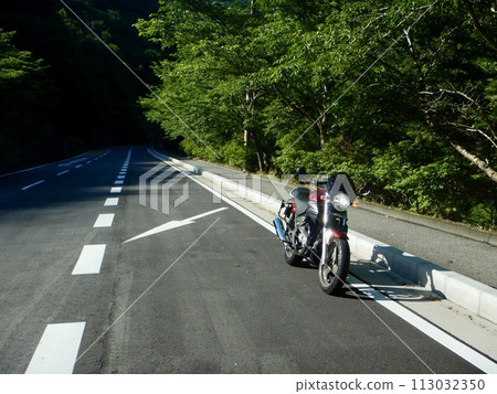 Ride around on an Italian red motorcycle 113032350