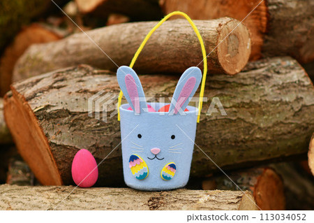Bunny-shaped bag for finding chocolate eggs for Easter Bunny-shaped bag for finding chocolate eggs for Easter 113034052
