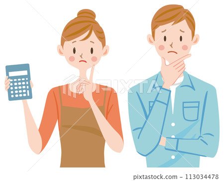 A couple with a calculator who is struggling with household finances 113034478
