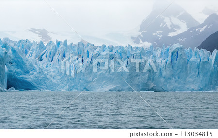Majestic Blue Ice Glacier Front Rising from the Sea Majestic Blue Ice Glacier Front Rising from the Sea 113034815