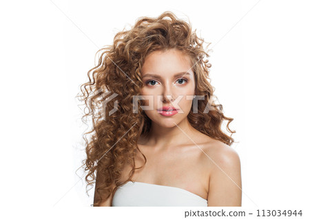 Nice good-looking redhead woman with clean skin, curly hairstyle and natural make-up. Female model Nice good-looking redhead woman with clean skin, curly hairstyle and natural make-up. Female model 113034944
