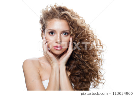 Elegant good-looking redhead woman with clean skin, curly hairstyle and natural make-up. Elegant good-looking redhead woman with clean skin, curly hairstyle and natural make-up. 113034960