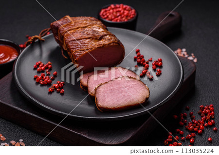 Delicious smoked meat pork or chicken with salt, spices and herbs Delicious smoked meat pork or chicken with salt, spices and herbs 113035224