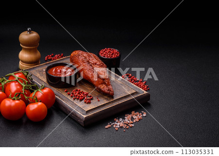 Delicious smoked meat chicken breast with salt, spices and herbs Delicious smoked meat chicken breast with salt, spices and herbs 113035331