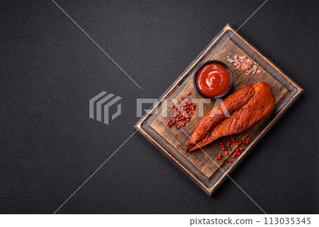 Delicious smoked meat chicken breast with salt, spices and herbs 113035345