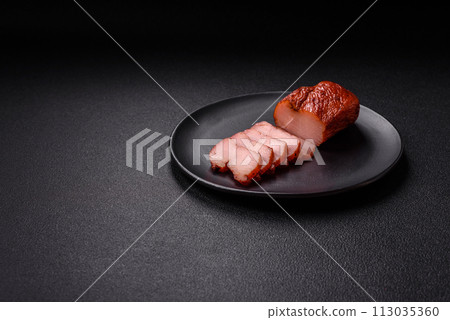 Delicious smoked meat chicken breast with salt, spices and herbs 113035360