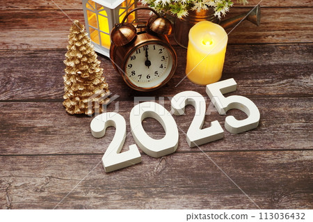 Happy New Year 2025 and Christmas Holiday Decoration on wooden background Happy New Year 2025 and Christmas Holiday Decoration on wooden background 113036432