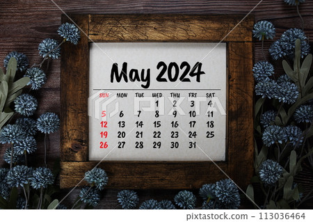 May 2024 monthly calendar with flower bouquet decoration on wooden background May 2024 monthly calendar with flower bouquet decoration on wooden background 113036464