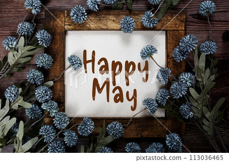 Happy May alphabet letters with flowers frame on wooden background Happy May alphabet letters with flowers frame on wooden background 113036465