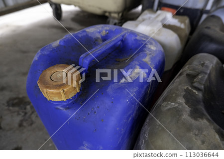 Detail of old oil barrel, pollution and recycling 113036644