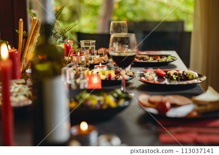 Brunch table setting with different delicious food and beverages ready for friends home party 113037141