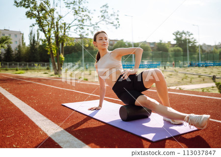 Sport woman doing exercises outdoors in morning. Active life, sports training, healthy lifestyle. 113037847