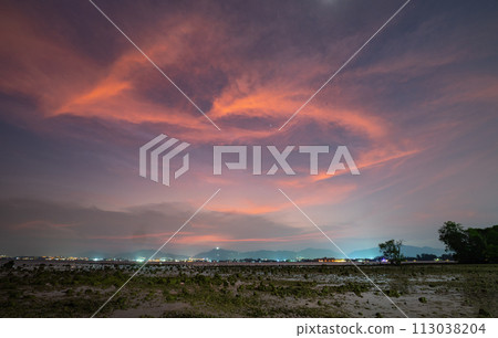 aerial view amazing pink clouds in sunset above the ocean. aerial view amazing pink clouds in sunset above the ocean. 113038204