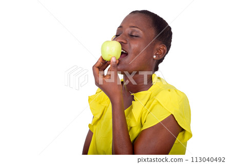 portrait of young girl with apple. portrait of young girl with apple. 113040492