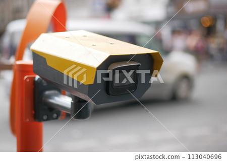 Urban security camera placements near vehicles captured in video footage Urban security camera placements near vehicles captured in video footage 113040696