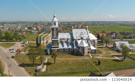 The Catholic Church of Our Lady of Ruzhantsova in the village of Radun. Belarus. Aerial view. The Catholic Church of Our Lady of Ruzhantsova in the village of Radun. Belarus. Aerial view. 113040814
