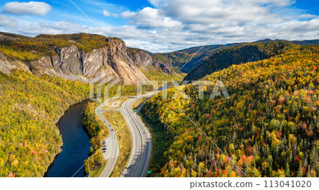 Scenic road in Canadian Mountain Landscape Valley with River. Fall Season. Corner Brook, Newfoundland, Canada 113041020