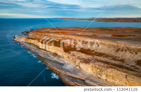 Rocky Shore on East Coast of Atlantic Ocean. Aerial Nature Background. Rocky Shore on East Coast of Atlantic Ocean. Aerial Nature Background. 113041126