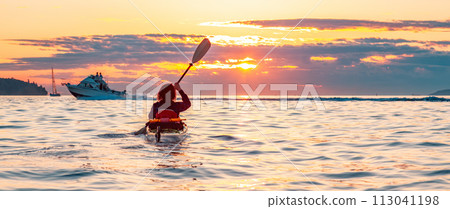 Kayaking at Colorful Sunset in Vancouver, BC, Canada 113041198