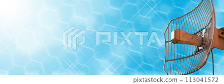 Mesh antenna for cellular telecommunications network and wireless internet against a blue sky. Receiving and digitizing multiple pieces of information at once. In the sunshine. Panoramic frame. 113041572