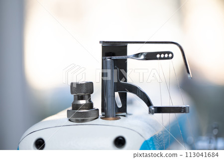 Industrial sewing machine, 3-needle cylindrical render for tailoring factory. Industrial sewing machine, 3-needle cylindrical render for tailoring factory. 113041684