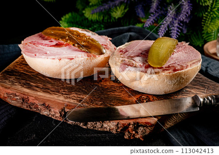 Tasty sandwich with brawn and pickled cucumber. Tasty sandwich with brawn and pickled cucumber. 113042413