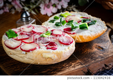 Sandwich with cheese, radish and chives. 113042416