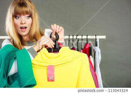 Woman holding discount label. Sale and retail. Woman holding discount label. Sale and retail. 113043324