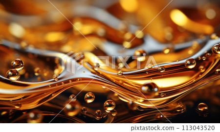 Oil drops on water. Oil spheres floating in a golden liquid. Bubbles of different sizes on orange abstract background 113043520