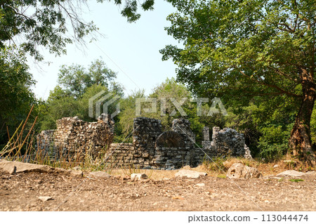 Ruins of Great Basilica in Butrint National Park, Buthrotum, Albania. Triconch Palace at Butrint Life and death of an ancient Roman house Historical medieval Venetian Tower surrounded. High quality Ruins of Great Basilica in Butrint National Park, Buthrotum, Albania. Triconch Palace at Butrint Life and death of an ancient Roman house Historical medieval Venetian Tower surrounded. High quality 113044474
