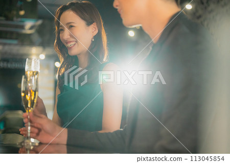 Couple drinking champagne Couple drinking champagne 113045854