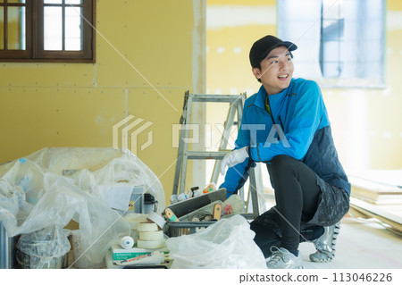 A young man working in the interior design industry A young man working in the interior design industry 113046226