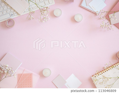 A cute workspace frame with stationery and hazy items arranged on a pale pink background A cute workspace frame with stationery and hazy items arranged on a pale pink background 113046809