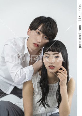 Genderless makeup image: young men and women looking at the camera Genderless makeup image: young men and women looking at the camera 113048750