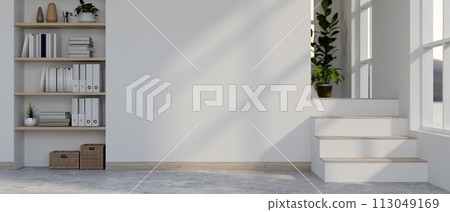 A modern minimalist white home corridor features two layers of flooring, shelves with decor. A modern minimalist white home corridor features two layers of flooring, shelves with decor. 113049169