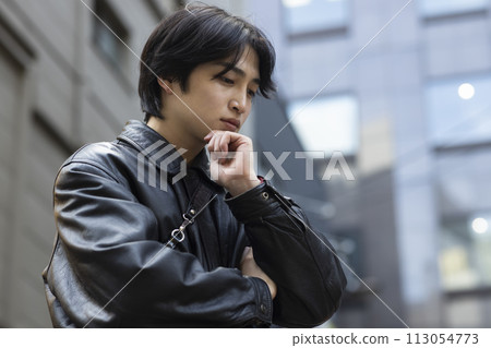 young man living in the city young man living in the city 113054773