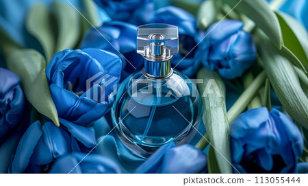 Perfume bottle in flowers, fragrance on blooming background, floral scent and cosmetic product Perfume bottle in flowers, fragrance on blooming background, floral scent and cosmetic product 113055444