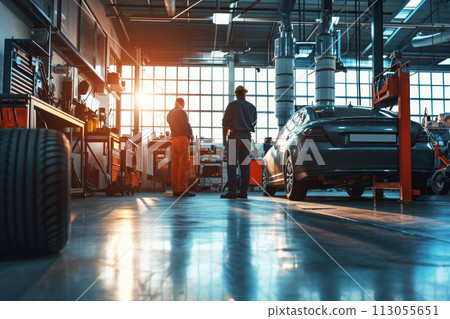 Mechanic man and car in service garage, automotive maintenance concept 113055651