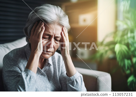 Senior woman suffering from headache or dizziness 113057231