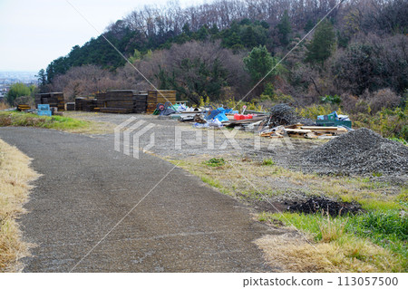 Hilly and mountainous farmland that has been turned into a material storage area due to conversion to farmland. 113057500