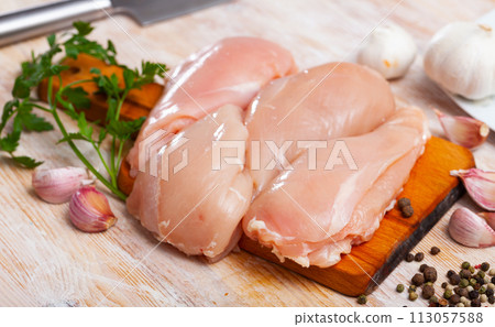 Raw chicken breast fillet ready for cooking Raw chicken breast fillet ready for cooking 113057588