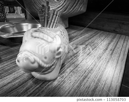 cow on the dining room table 113058703