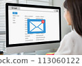 Businesswoman sitting using computer with checking email inbox on website. 113060122