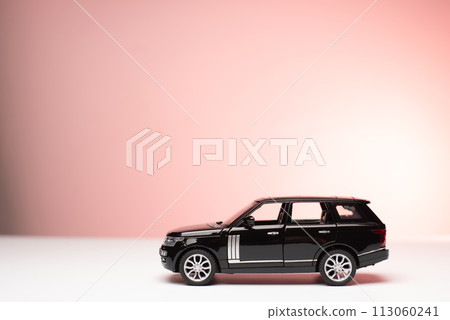 car insurance. black toy car isolated car insurance. black toy car isolated 113060241