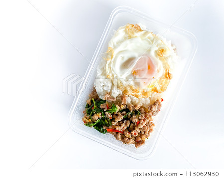 Rice topped with pork with Thai basil and fried egg Rice topped with pork with Thai basil and fried egg 113062930